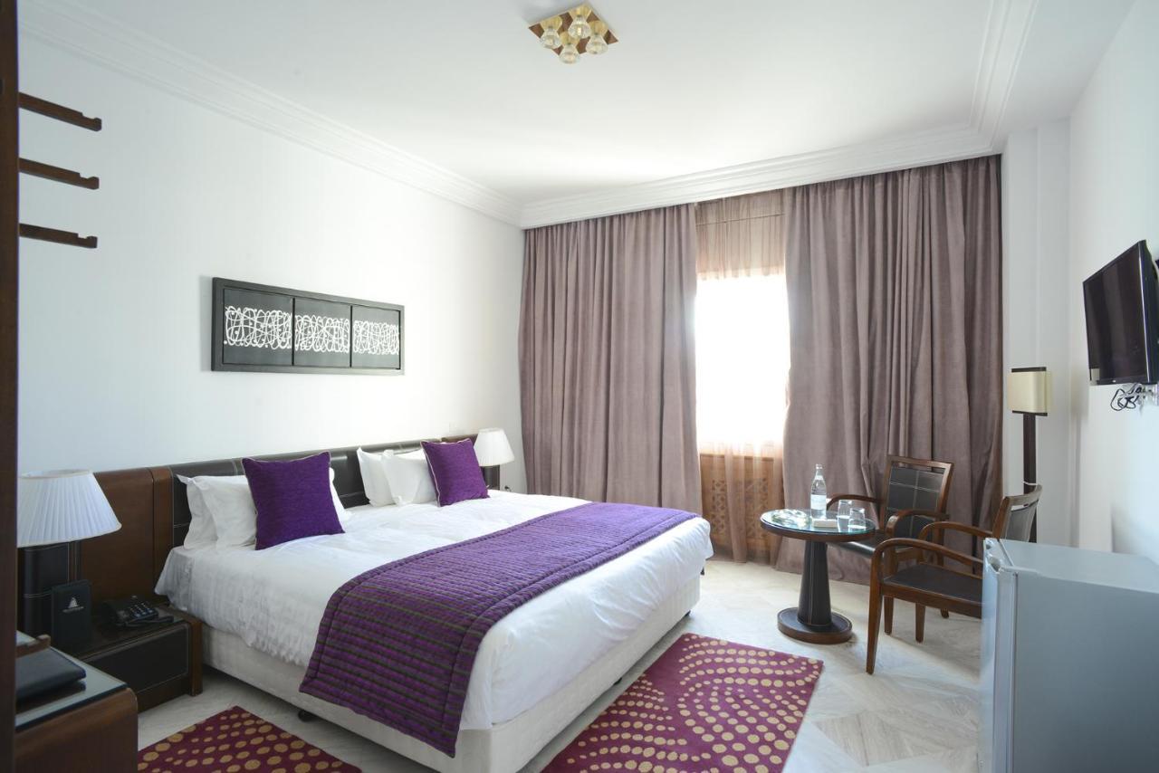 The Penthouse Suites Hotel Ariana Bagian luar foto