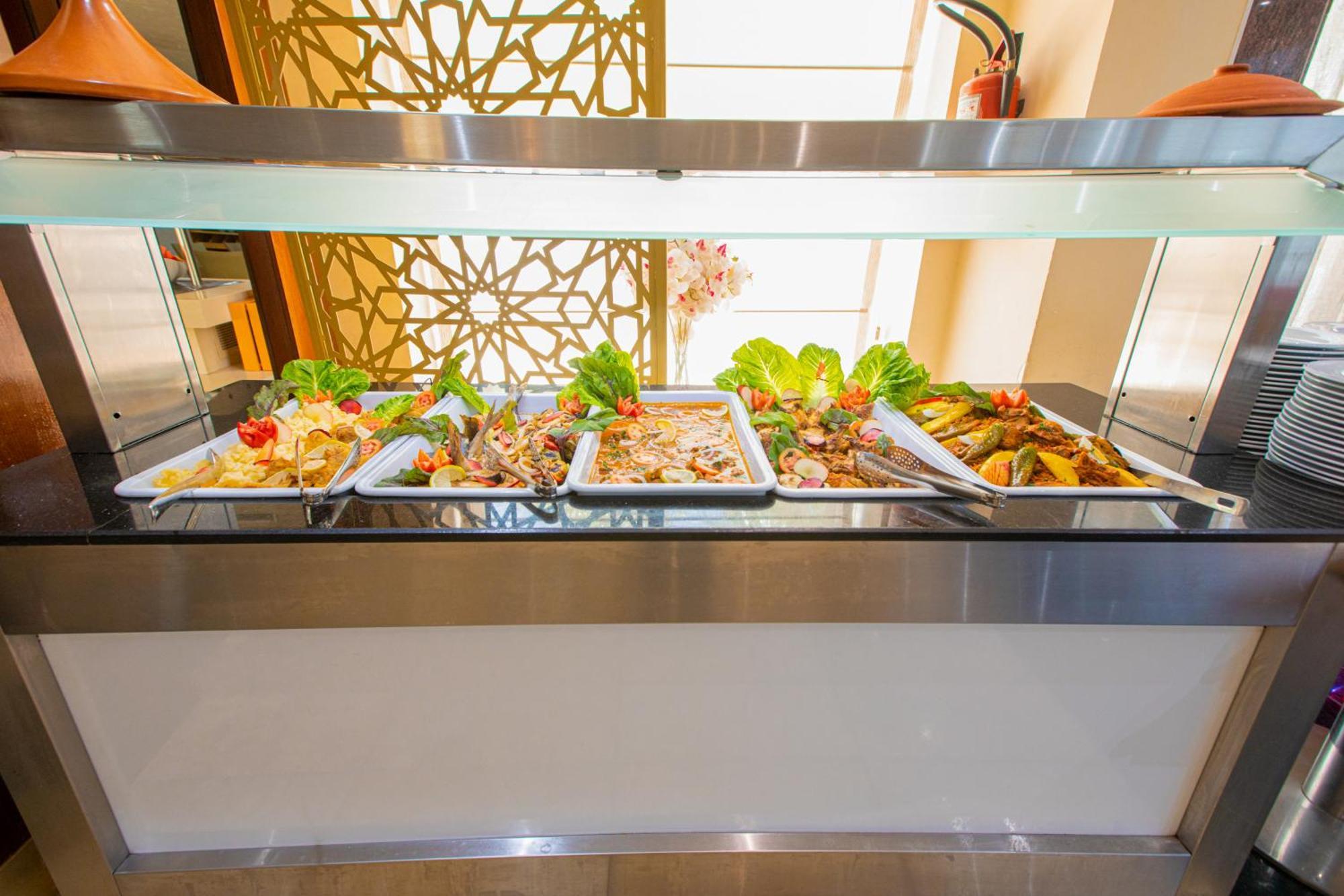 The Penthouse Suites Hotel Ariana Bagian luar foto