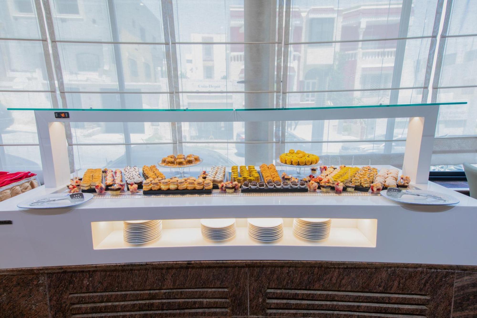 The Penthouse Suites Hotel Ariana Bagian luar foto