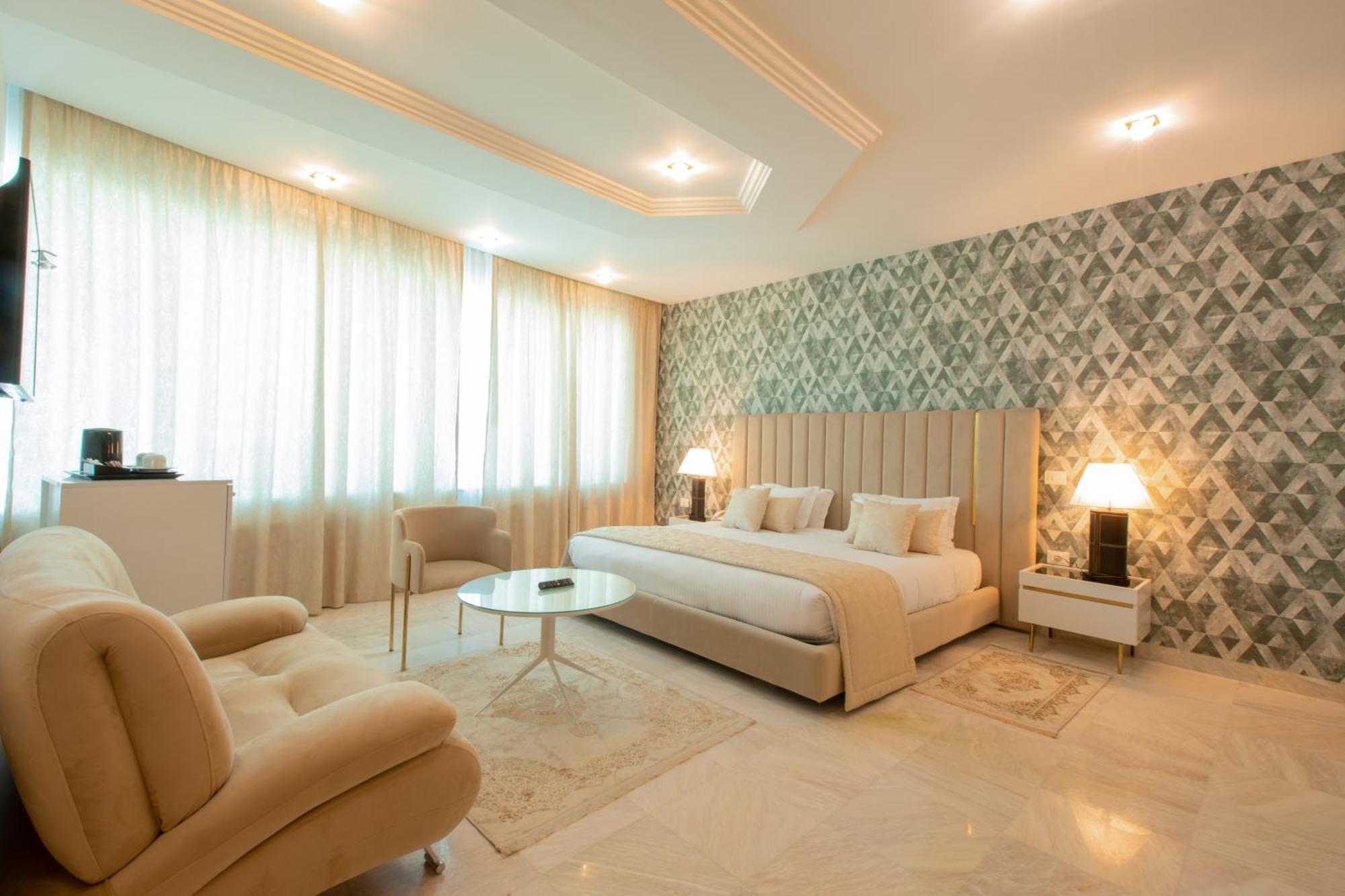 The Penthouse Suites Hotel Ariana Bagian luar foto